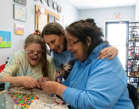 Three women doing crafts